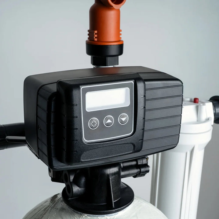 The digital control valve on a Crystal Quest water softener
