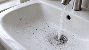 Black Specks in Your Water: What They Are and How to Find the Source