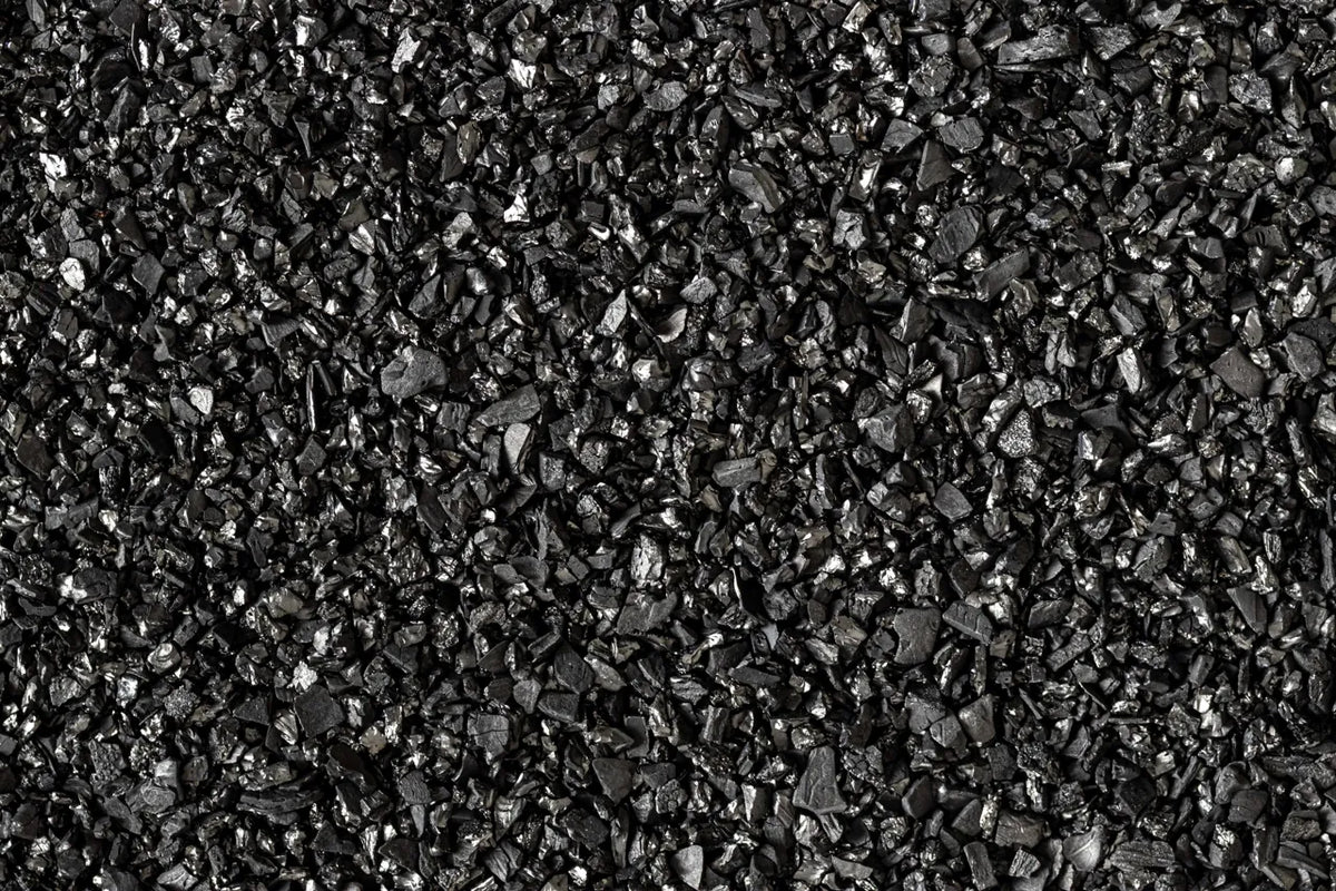 Close up texture of granular activated carbon water filter media