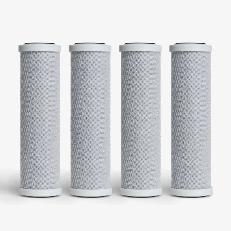 Coconut Based 5-Micron Carbon Block Cartridge, 2-7/8 x 9-3/4 inch pack of four gray mesh-wrapped blocks with white end caps