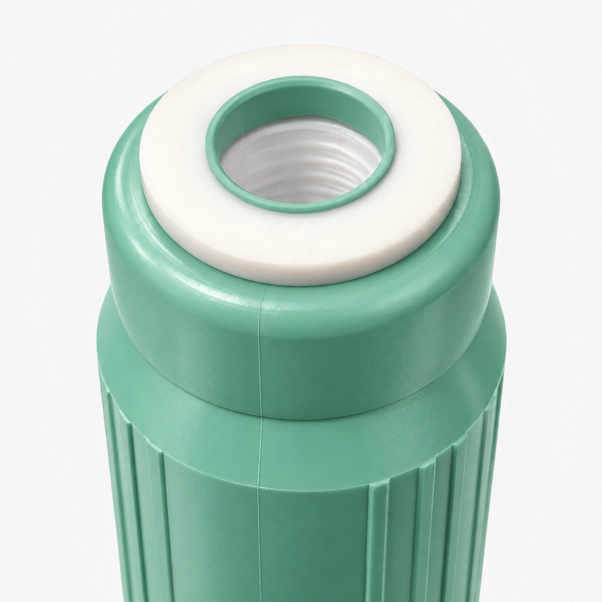 Alkalize/Ionizer, Mineralizer & Oxidation Cartridge, 2-7/8 inch size: close-up of the top cap and white gasket around the threaded center port