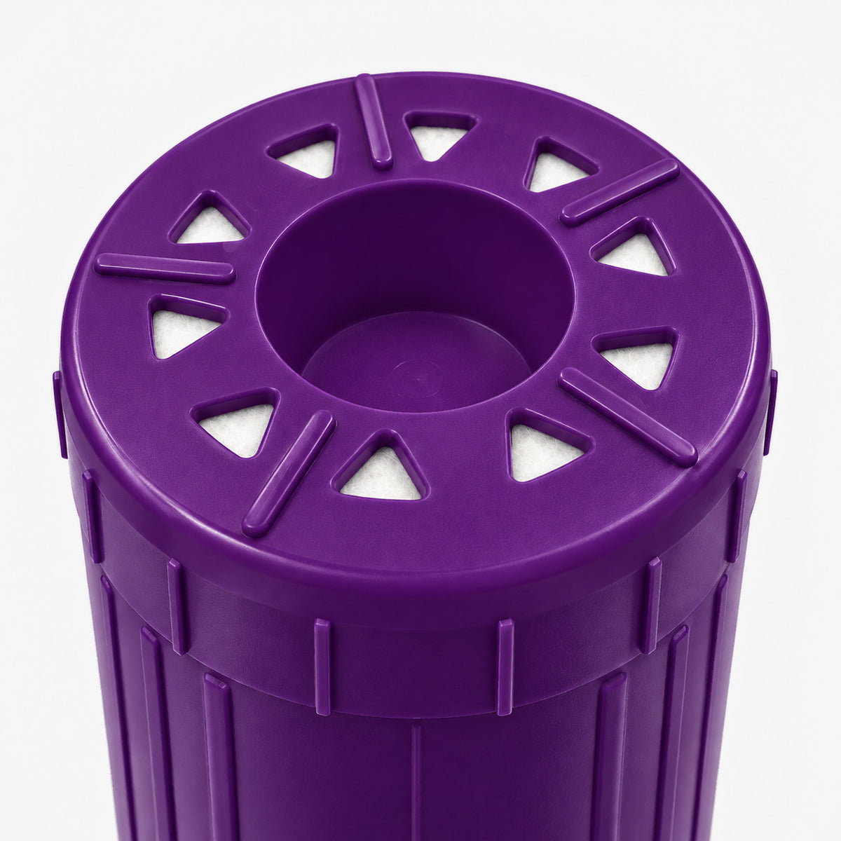 Arsenic Removal + SMART Filter Cartridge, 2-7/8 inch size: close-up of the bottom end, triangular openings with white pads around the center well