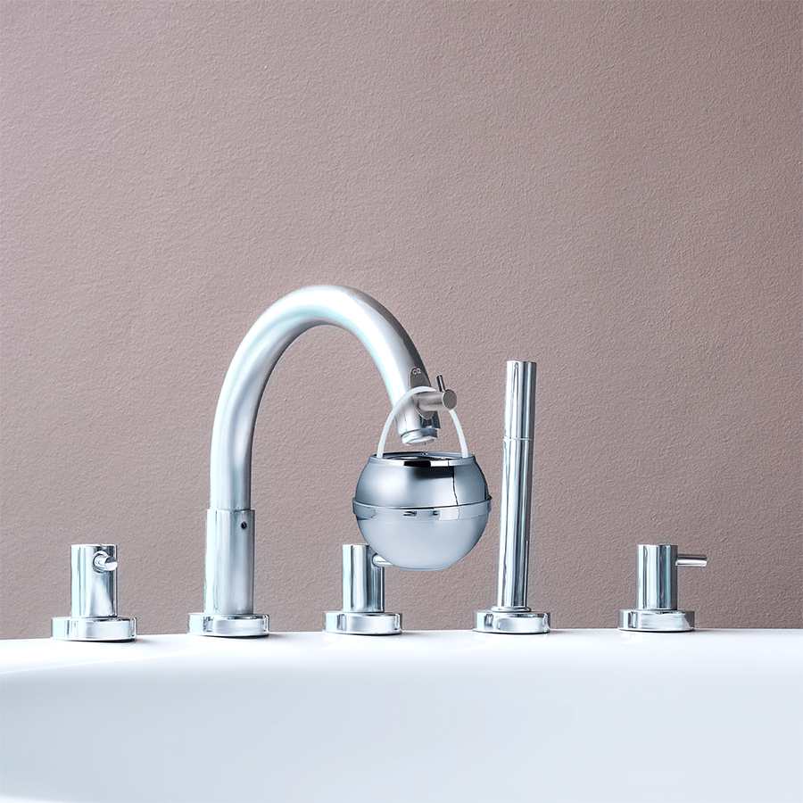 Bath Ball hanging from the Bath Ball Hook on a chrome bathtub spout, water off