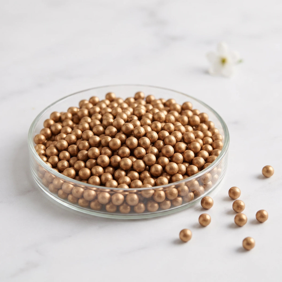 Copper ERA alloy spheres in a glass dish
