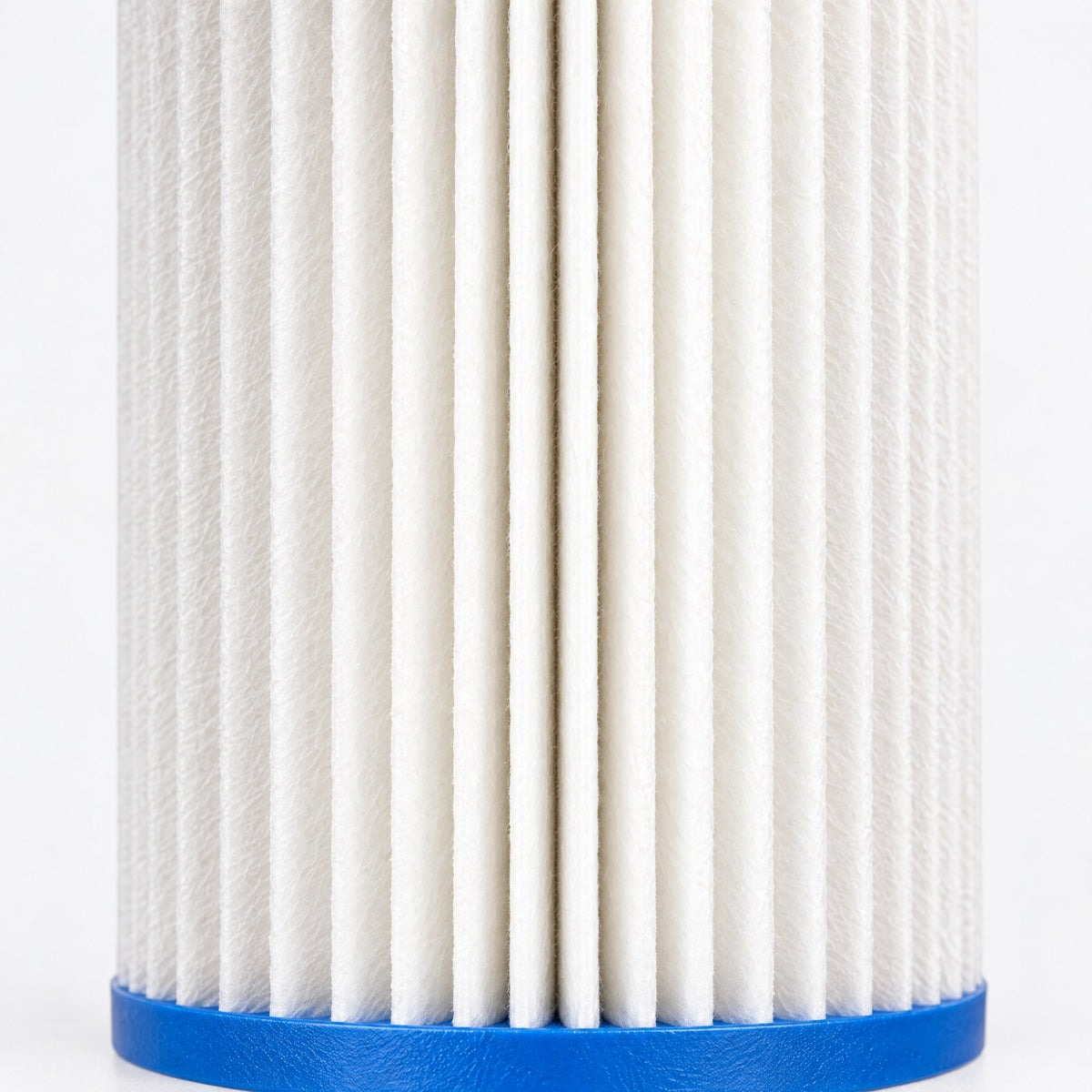 Close-up of crisp pleated filter media above a blue end cap