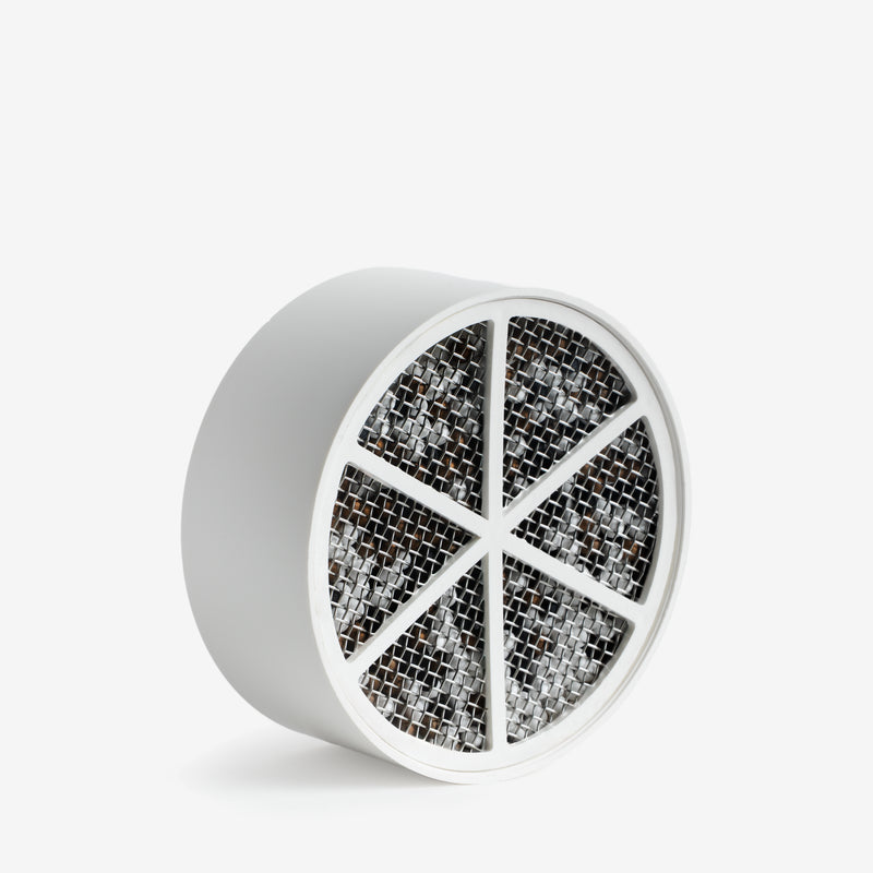 Bath Ball Replacement Cartridge, round white cartridge angled to show filter media behind mesh