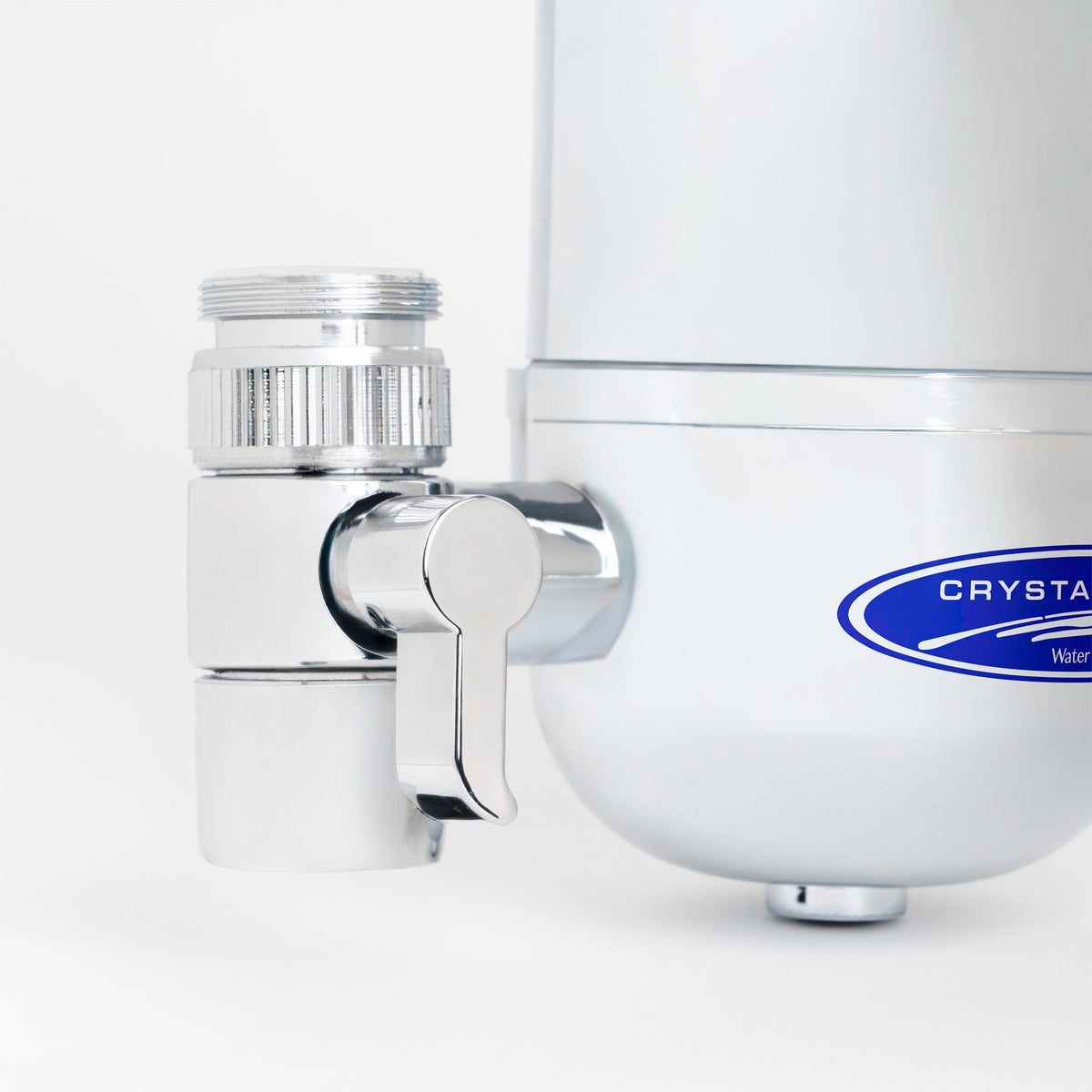 Faucet Mount Water Filter System, close-up of the chrome diverter valve lever on the white housing
