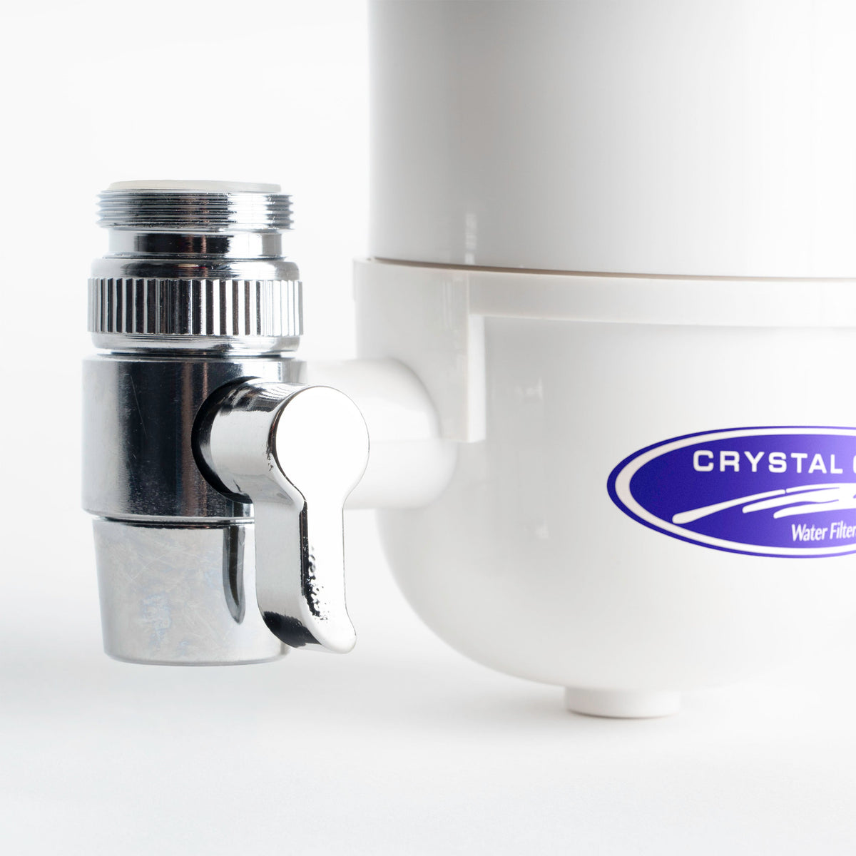 Faucet Mount Water Filter System, close-up of the diverter lever and faucet thread on the white housing