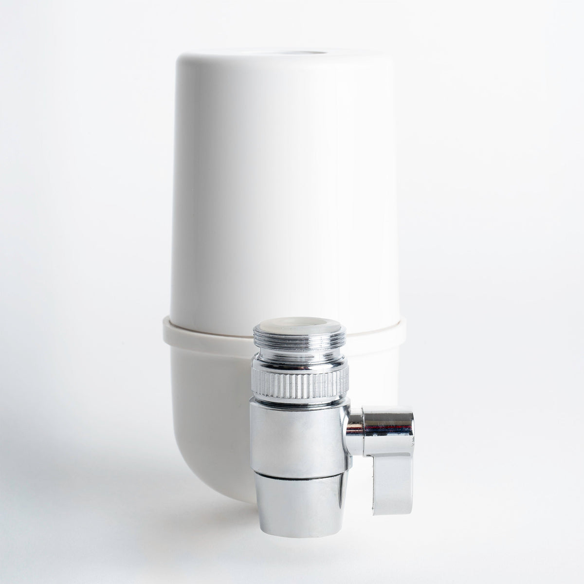 Faucet Mount Water Filter System, white finish, front view of the chrome diverter valve