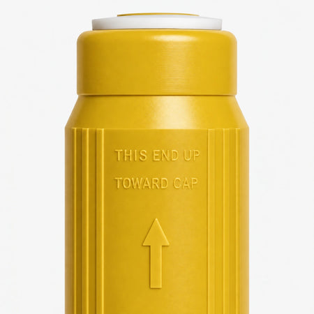 Iron Filter Cartridge, 2-7/8 inch size: close-up of the molded THIS END UP TOWARD CAP marking and arrow