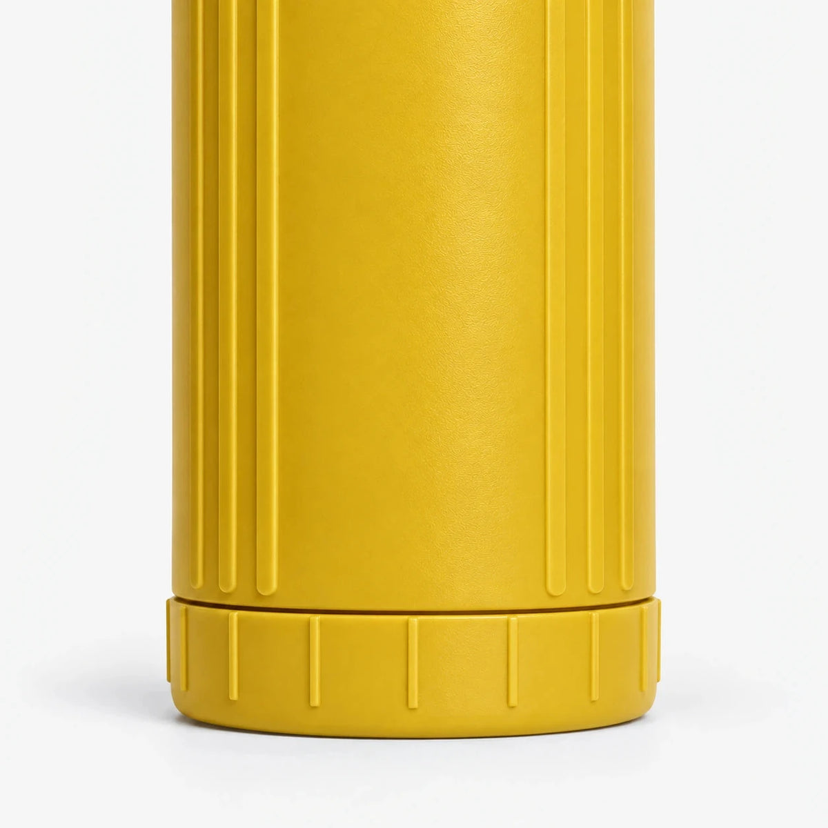 Iron Filter Cartridge, close-up of the ribbed yellow body and base ring