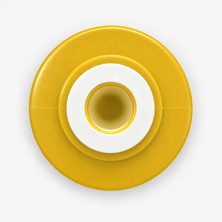 Iron Filter Cartridge, top view of the wide yellow end cap with white gasket and center opening
