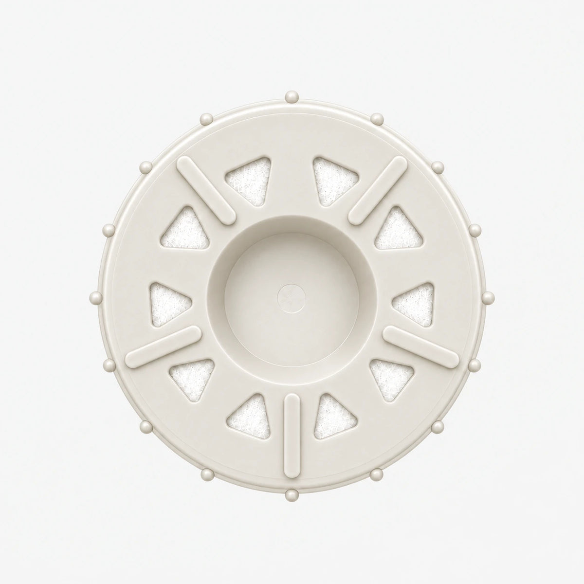 Nitrate Removal Filter Cartridge, 2-7/8 inch size: bottom end seen straight on, ten triangular openings with white pads around the center