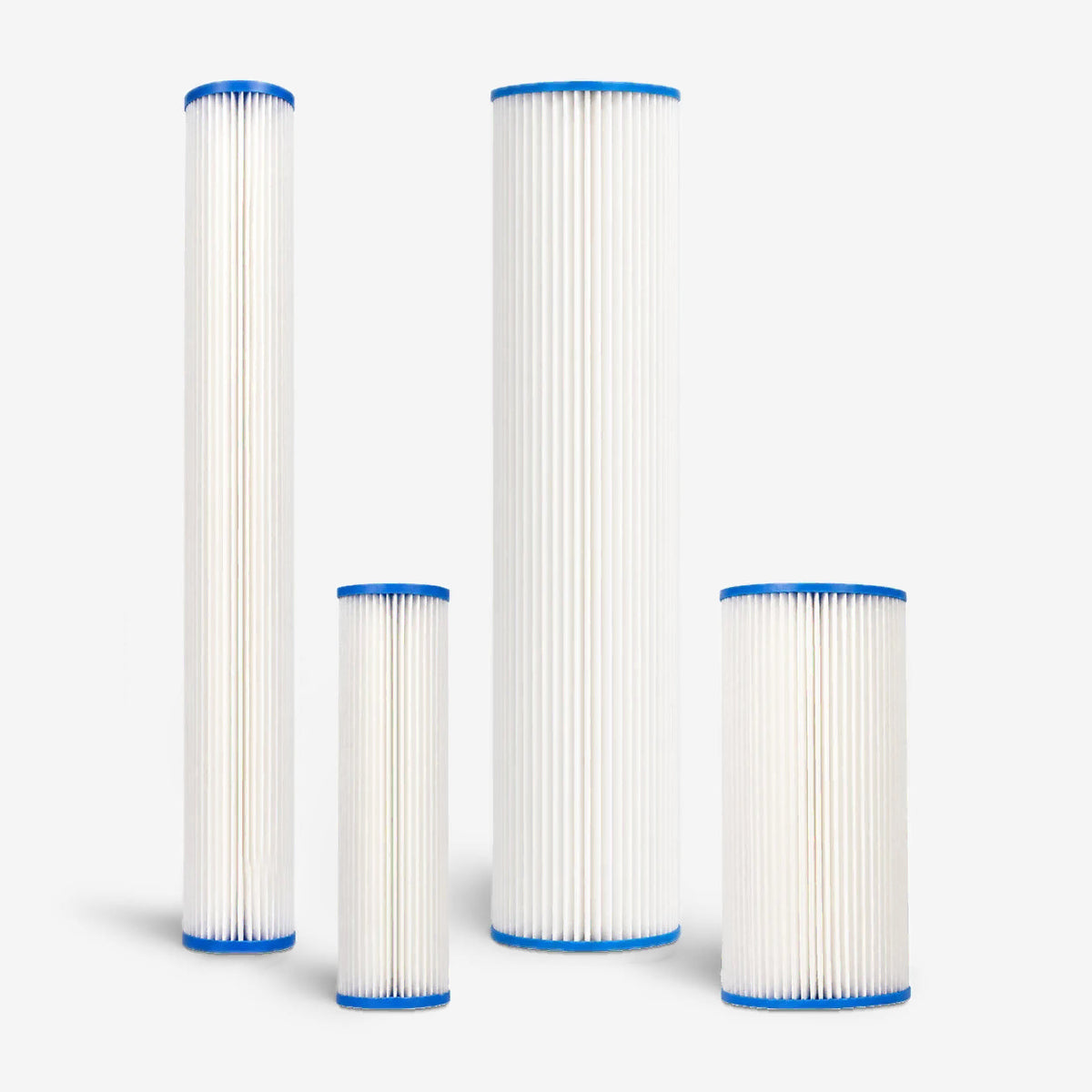 Pleated Cellulose Sediment Cartridge, four white pleated cartridges with blue end caps in two diameters and two heights