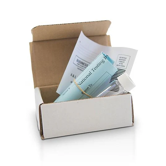 Radon Water Test kit, open shipping box with clear sample vial, lab paperwork and prepaid return envelope