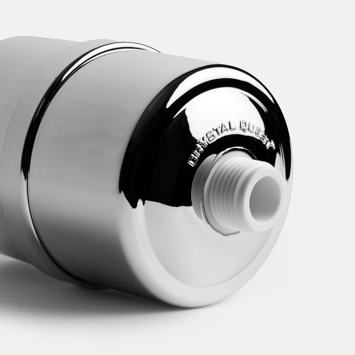 Shower Filter in chrome, close-up of threaded inlet and Crystal Quest name embossed on the top