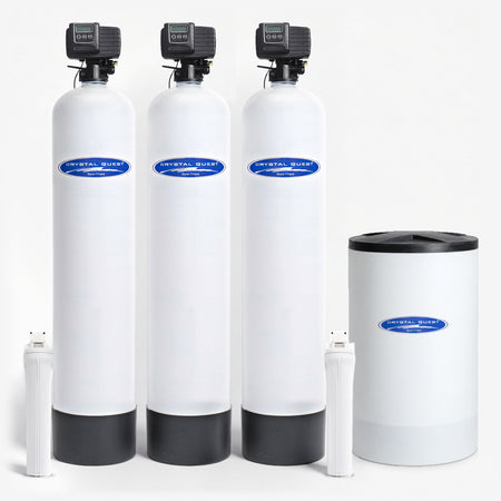 Nitrate Whole House Water Filter with SMART Filter and Softener, three white fiberglass tanks, a white brine tank and two white filter housings