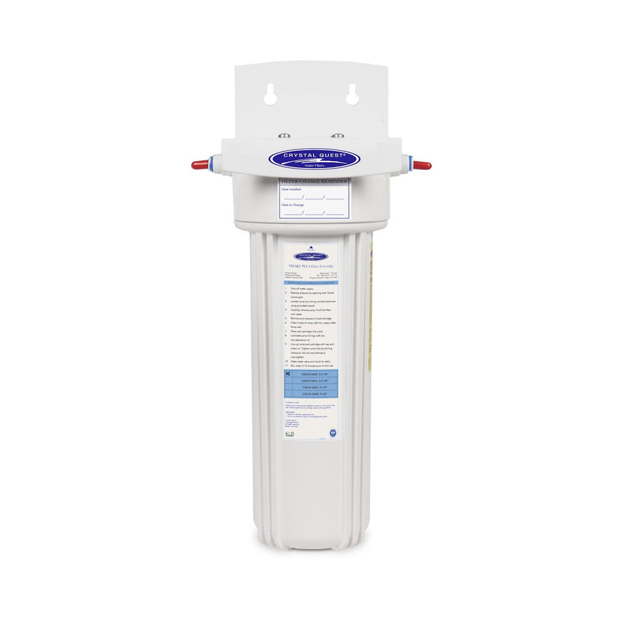 Inline water filter, white housing on a wall bracket with a SMART PLUS Filter Cartridge label